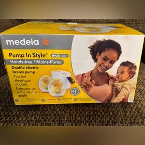 Medela Freestyle Hands-Free Pump in Yellow and White